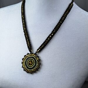 Elegant Beaded Necklace with Gold and Black Accents